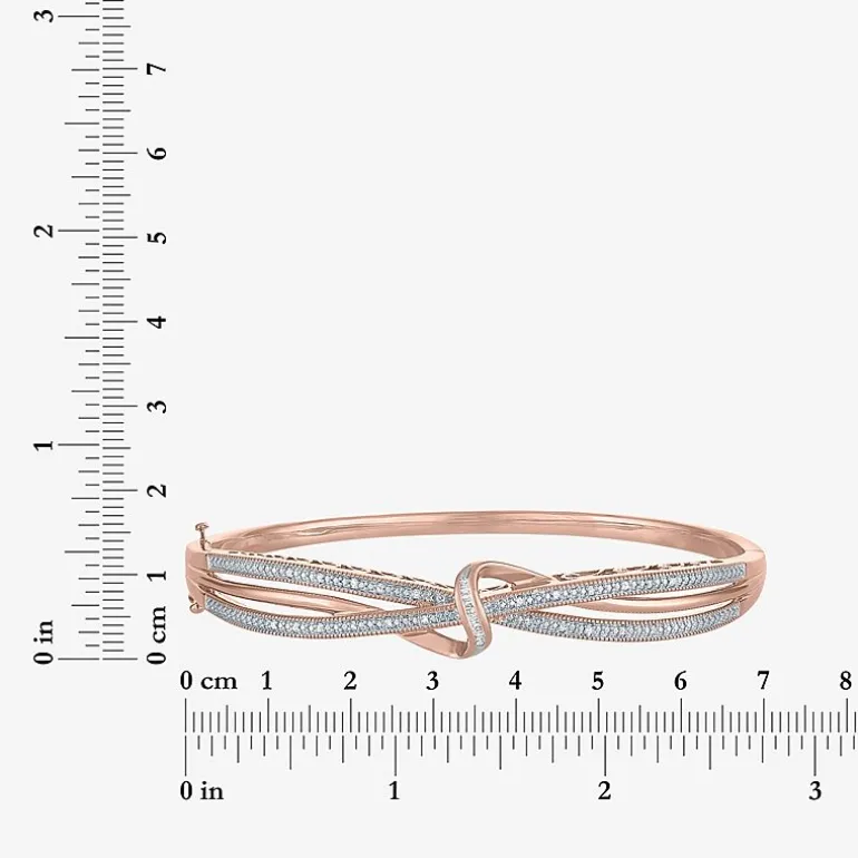 1/10 CT. T.W. Diamond Crossover Bangle Bracelet in Sterling Silver or 14K Gold Over Silver