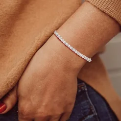 1/10 CT. T.W. Natural White Diamond Bolo Bracelet in Sterling Silver or 14K Gold Over Silver