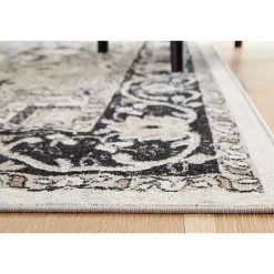 Signature Design by Ashley® Gregmoore Washable Indoor Rectangular Area Rug