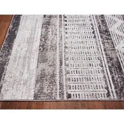 Signature Design by Ashley® Henchester Washable Indoor Rectangular Area Rug