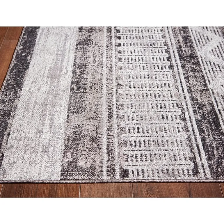 Signature Design by Ashley® Henchester Washable Indoor Rectangular Area Rug