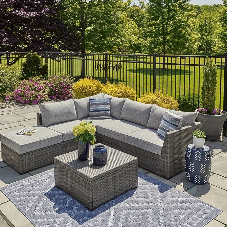 Signature Design by Ashley® Petal Road 4-pc. Outdoor Loveseat Sectional Ottoman Table Set